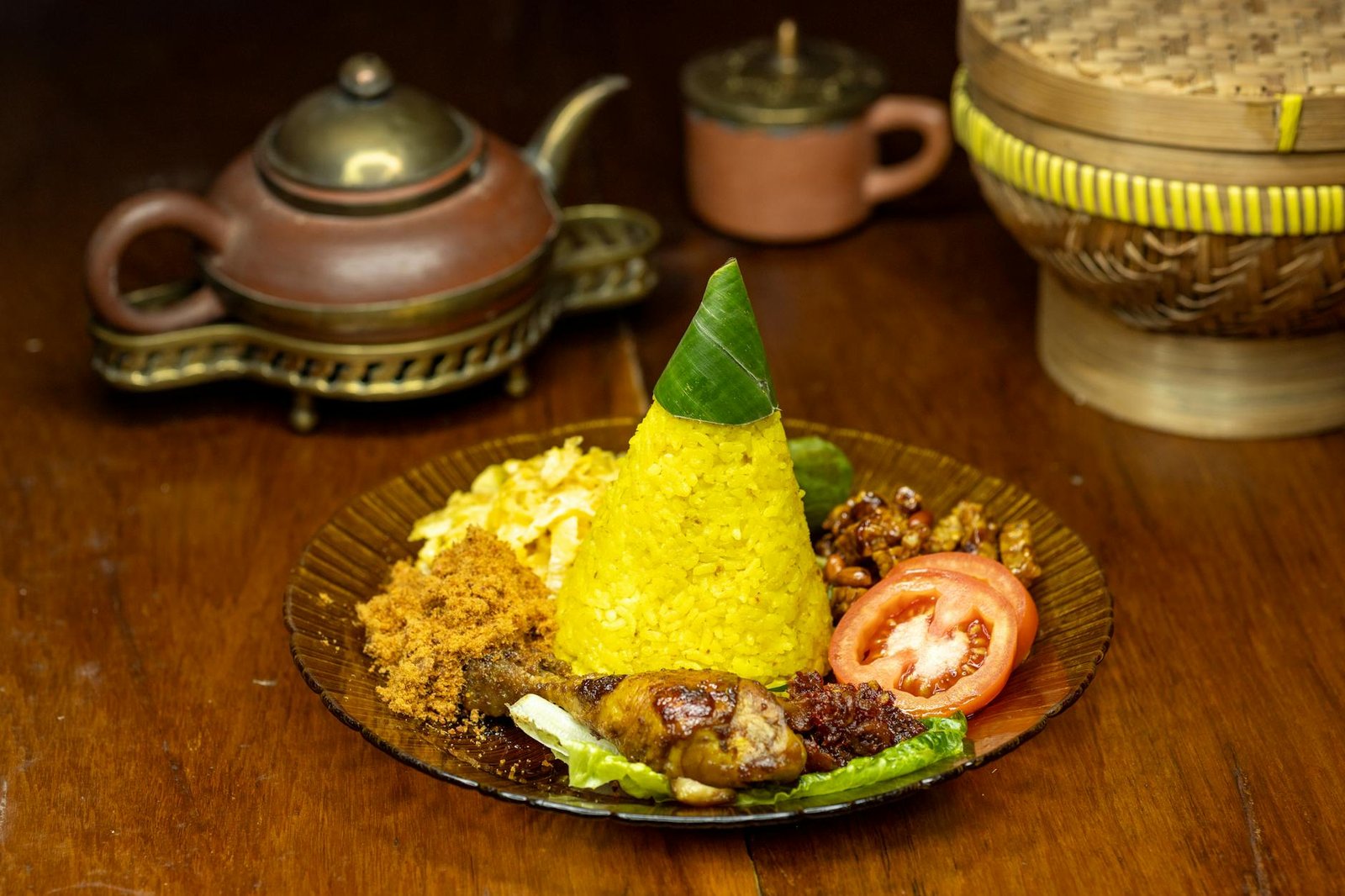 traditional indonesian nasi tumpeng with side dishes