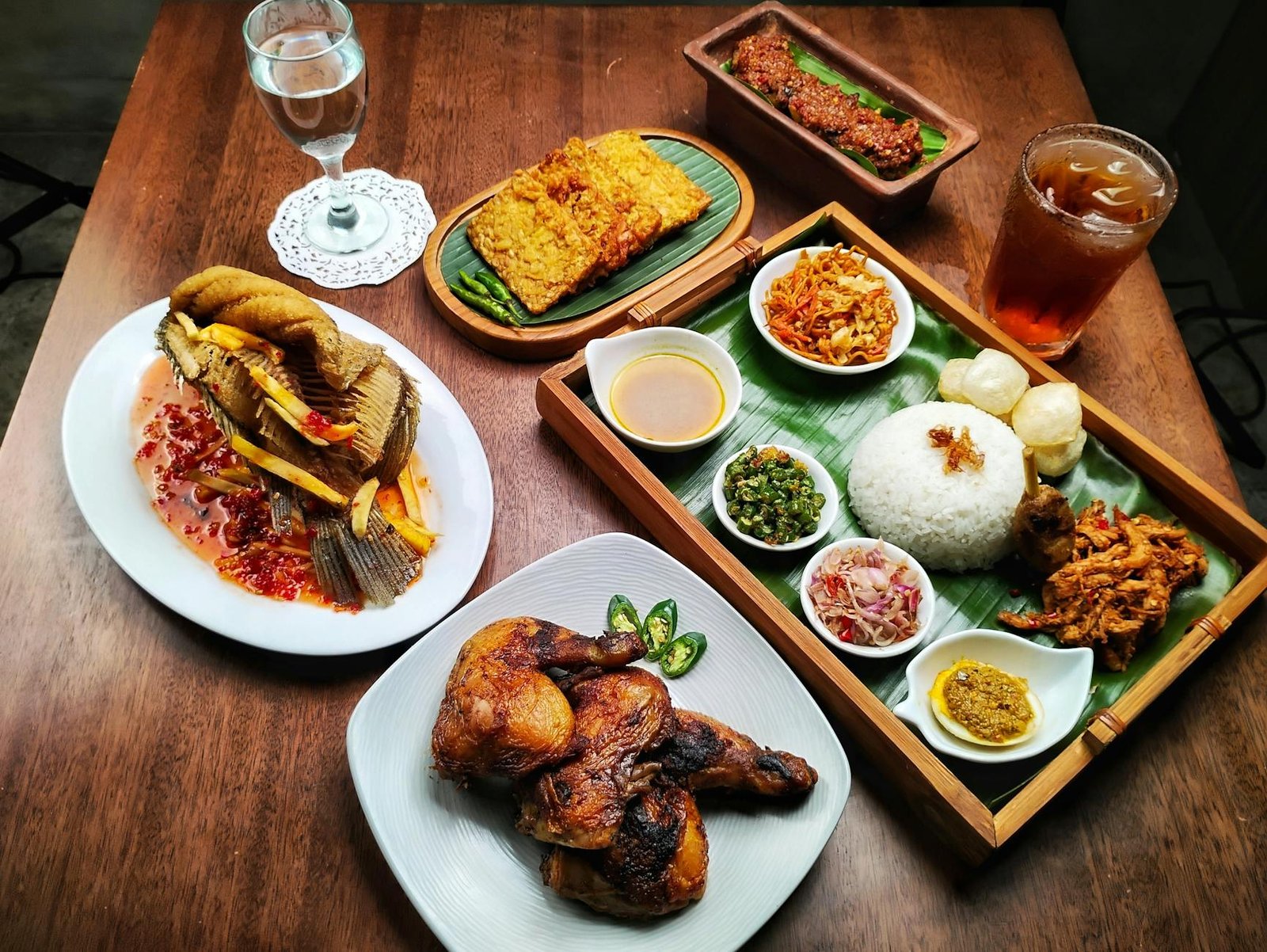 authentic indonesian cuisine on wooden table