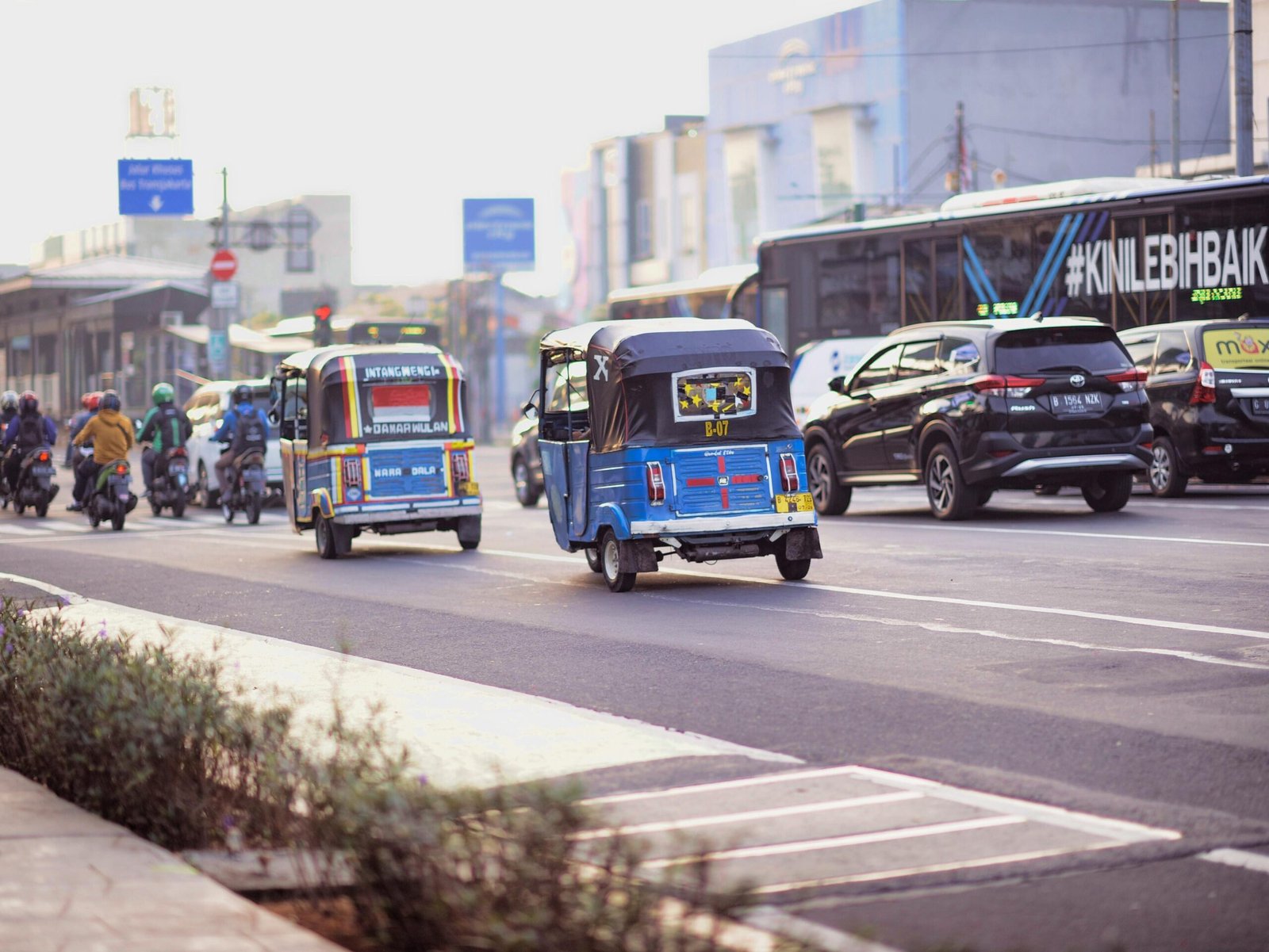 Traditional Local Transportation - Becak and Bajaj