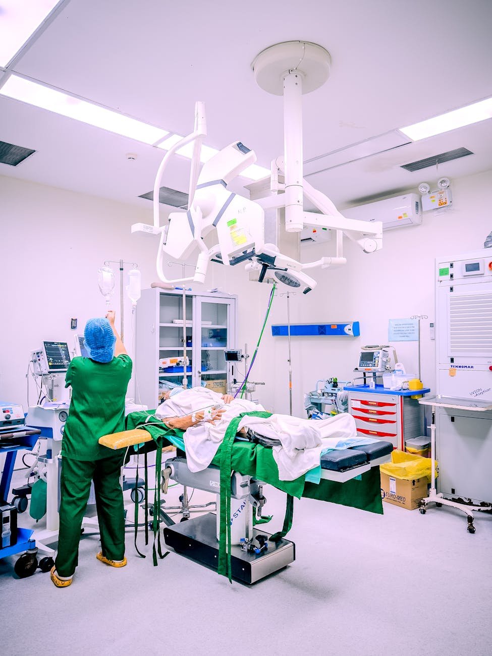 modern operating room with medical staff in action