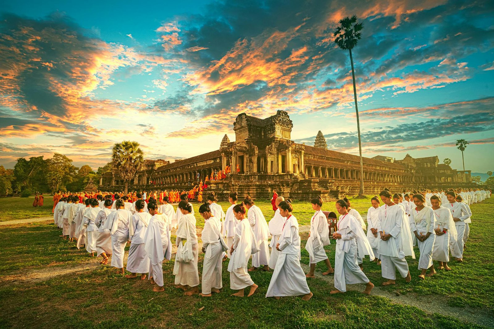 religious ceremony in meadow beside angkor wat temple